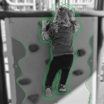 Taryn (age 3) rock climbing