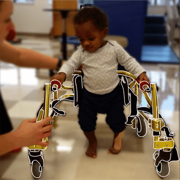 Tylynn, 2 years old, using their walker